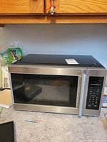 Front view of Hamilton Beach microwave on countertop