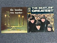 Front covers of both Beatles LPs side by side