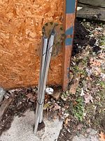 Full view of stacked aluminum tubes, fused glass crown visible