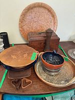Group shot showing wooden box, maple plate, pepper mill, trays, bowls, and accessories