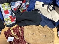 Overall view of five assorted bags laid out