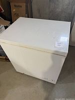 Front and top view of white chest freezer