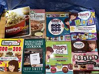 Group of Hungry Girl and other cookbooks on table