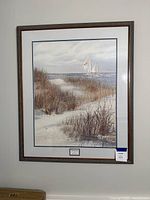 Full view of framed print on wall