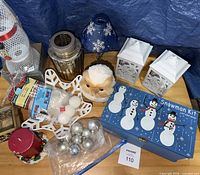 All items together showing owl, lanterns, snowman kit, ornaments, candle etc.