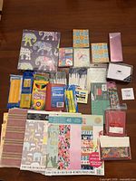 Overview of all paper pads, pencils, pens, sticky notes, envelopes, note cards