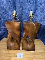 Pair of brown sculptural resin lamp bases with cords visible