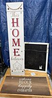 Tall Home Believes sign, brown plank happily ever after sign, back of square frame