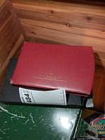 Closed red Royal Canadian Mint presentation case