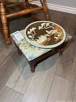 Footstool and plaque together for size reference