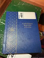 Front cover showing album title Canadian Halves 1870-1936