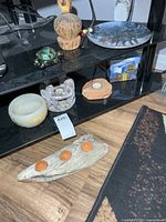 Group shot of all décor items on shelf and floor