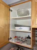 Cabinet view showing all items on two shelves