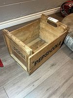 Angle showing side branding "PEPSI-COLA" and interior