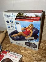 Front of retail box showing Waterlife Premium Recliner with model image and features text