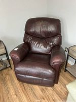 Front view of dark brown leather powered recliner chair