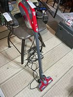 Full view of Dirt Devil stick vacuum with cord and floor head