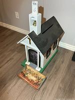 Wooden church card box with slot and relief plaque in front