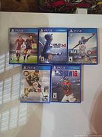 All five PS4 game cases arranged for overview