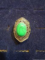 Top view showing turquoise cabochon and bezel