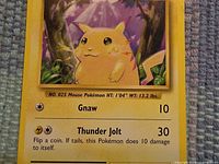 Front of Pikachu card showing artwork, stats, set info