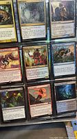 Binder page showing nine MTG cards
