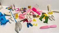 overview of all Barbie accessories on background