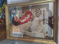 Full view of framed Elvis Presley mirror in gold frame