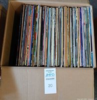 Box filled with vertically stored vinyl LPs