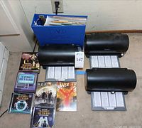 Overview of organizers, binder and several DVD/CD box sets