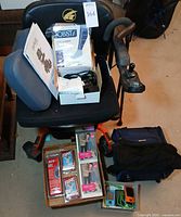 Overall lot showing wheelchair, accessories on seat and floor