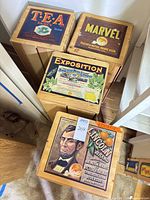 Top view of four crates showing colorful fruit labels