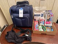 Travel bag and box of medical items overview