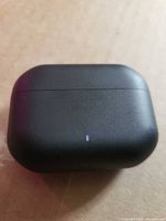 Closed black charging case front view