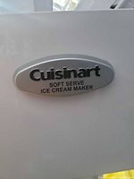 Cuisinart badge on appliance front