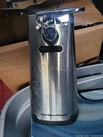 Front view of Hamilton Beach stainless steel can opener showing full unit