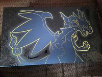 Top view of Charizard playmat artwork