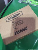 Carton lid showing Regiment and Fastenal branding