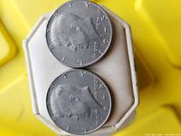 Obverse of both Kennedy half dollars showing 1974 and 1973 dates, visible wear