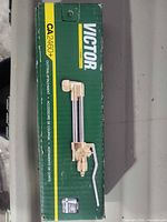 Factory box showing Victor branding and CA2460+ model