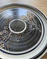 Front view showing floral pattern and glazing