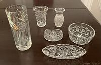 All six crystal pieces grouped on table