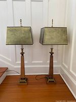 Front view of both Paul Hanson lamps with gold shades