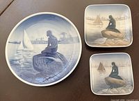 Front view of all three Little Mermaid porcelain pieces