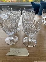 Front angled view of six Waterford Colleen wine glasses on tabletop