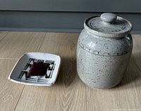 Both pottery pieces side by side