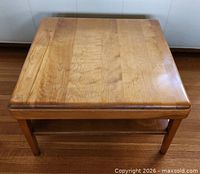 Top view of solid maple square coffee table showing grain and finish