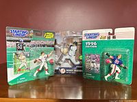 Front view of all three packaged action figures