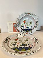 Front view of platter and bowl showing floral design and colours
