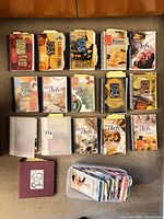 Group shot of all cookbooks, binders and magazines laid out on floor